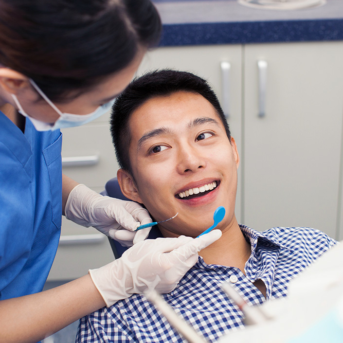 dentist with patient