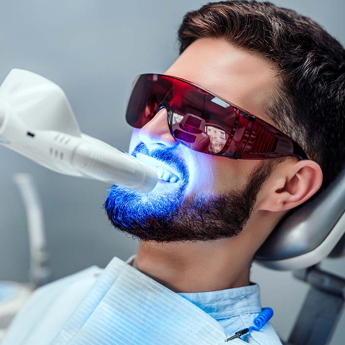 man having teeth whitened